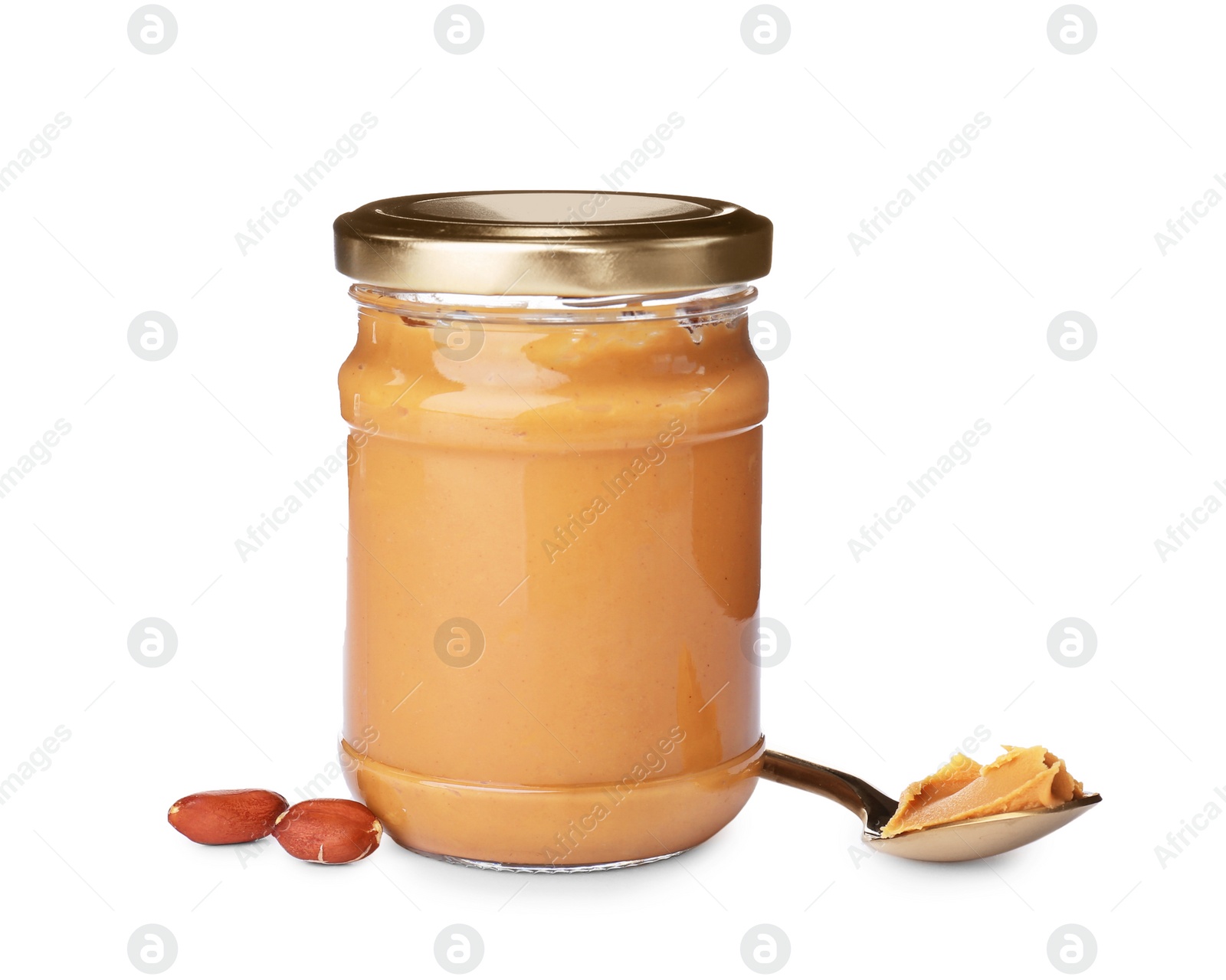 Photo of Jar and spoon with creamy peanut butter on white background