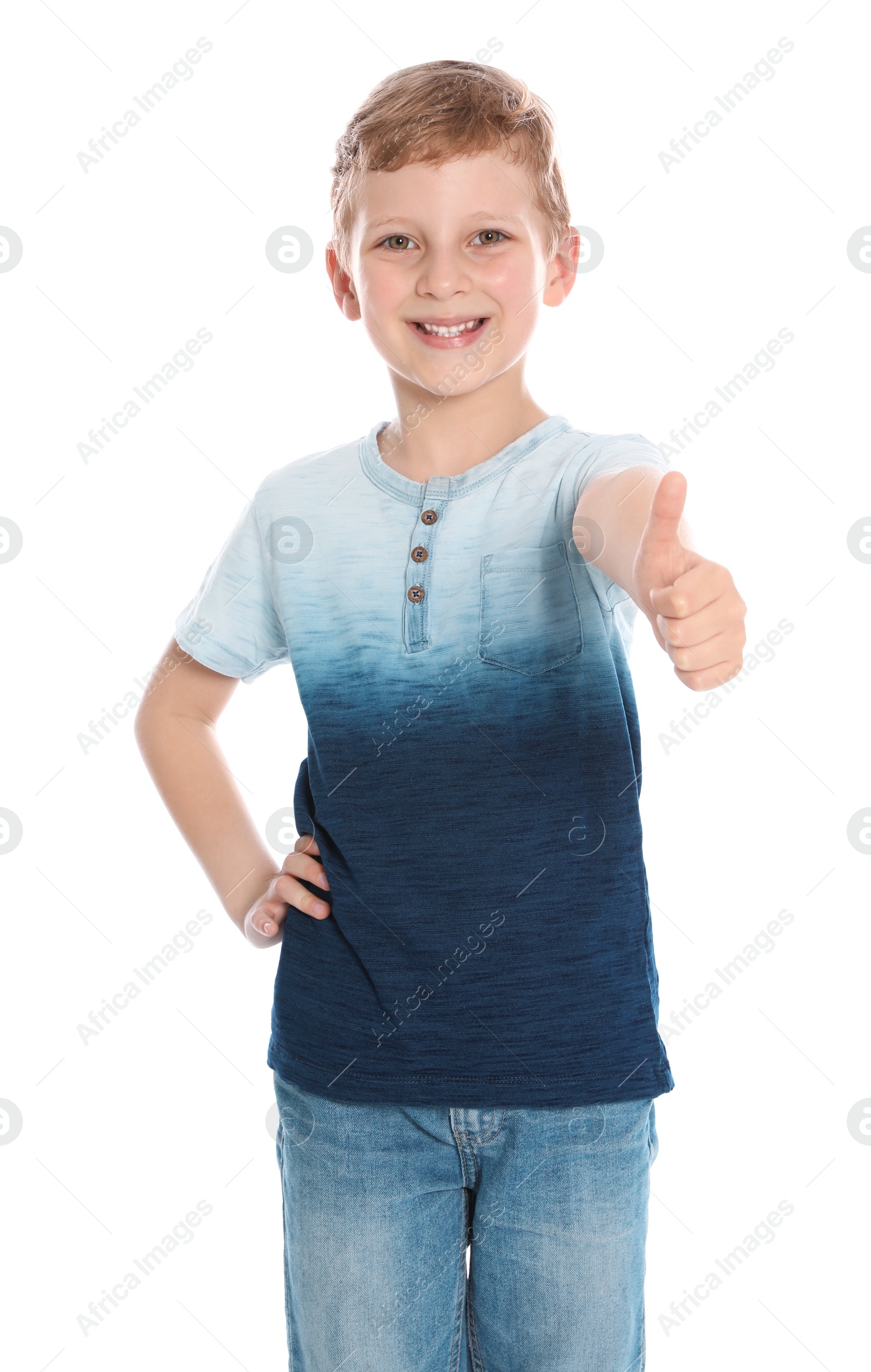 Photo of Portrait of cute little boy in casual outfit on white background