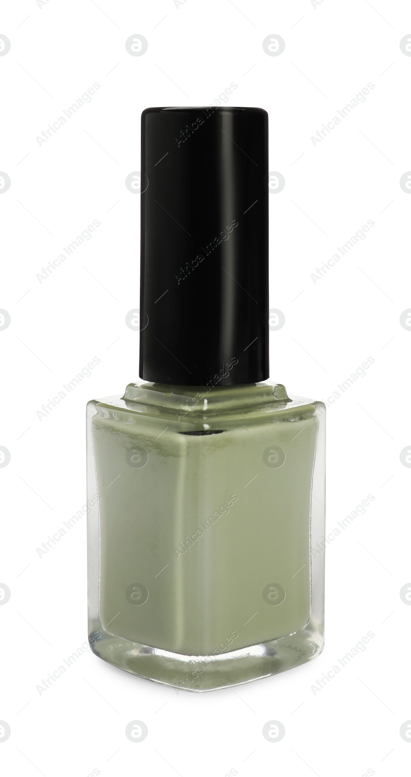 Photo of Green nail polish in bottle isolated on white