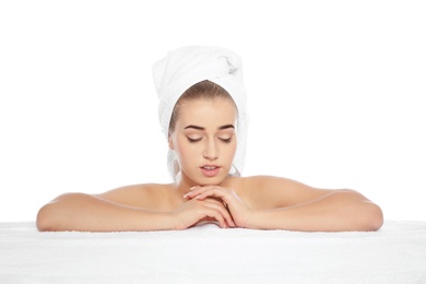 Photo of Portrait of young pretty woman with towel on white background