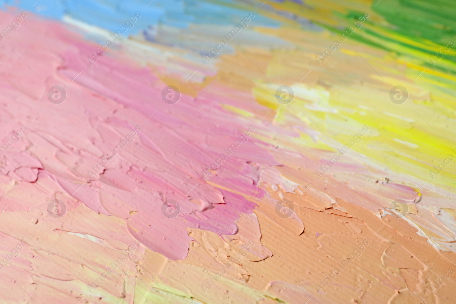 Photo of Beautiful strokes of pastel oil paints as background, closeup