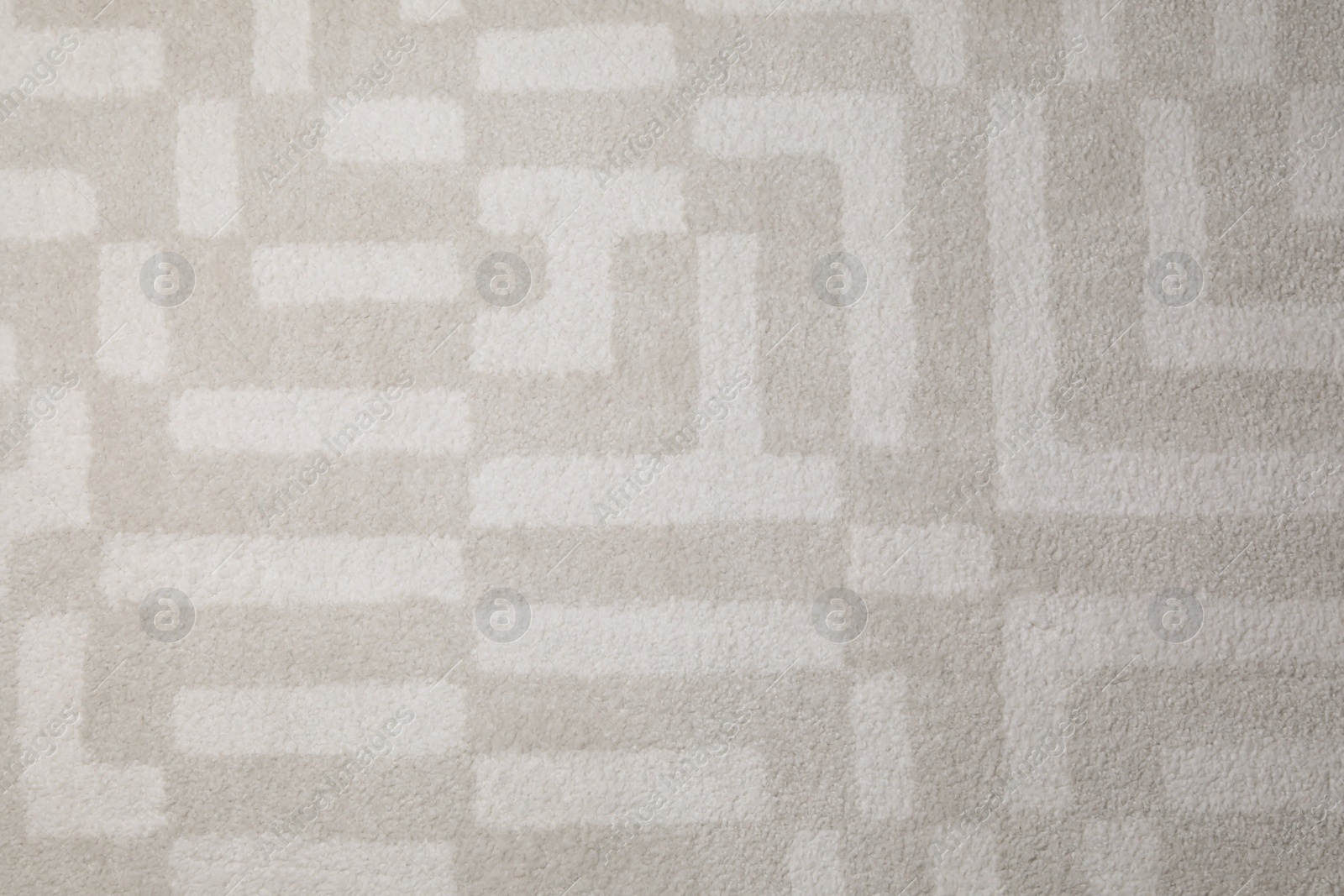 Photo of Fuzzy carpet texture as background, top view