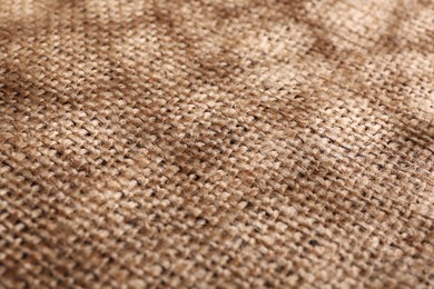 Photo of Texture of beige burlap fabric, closeup view