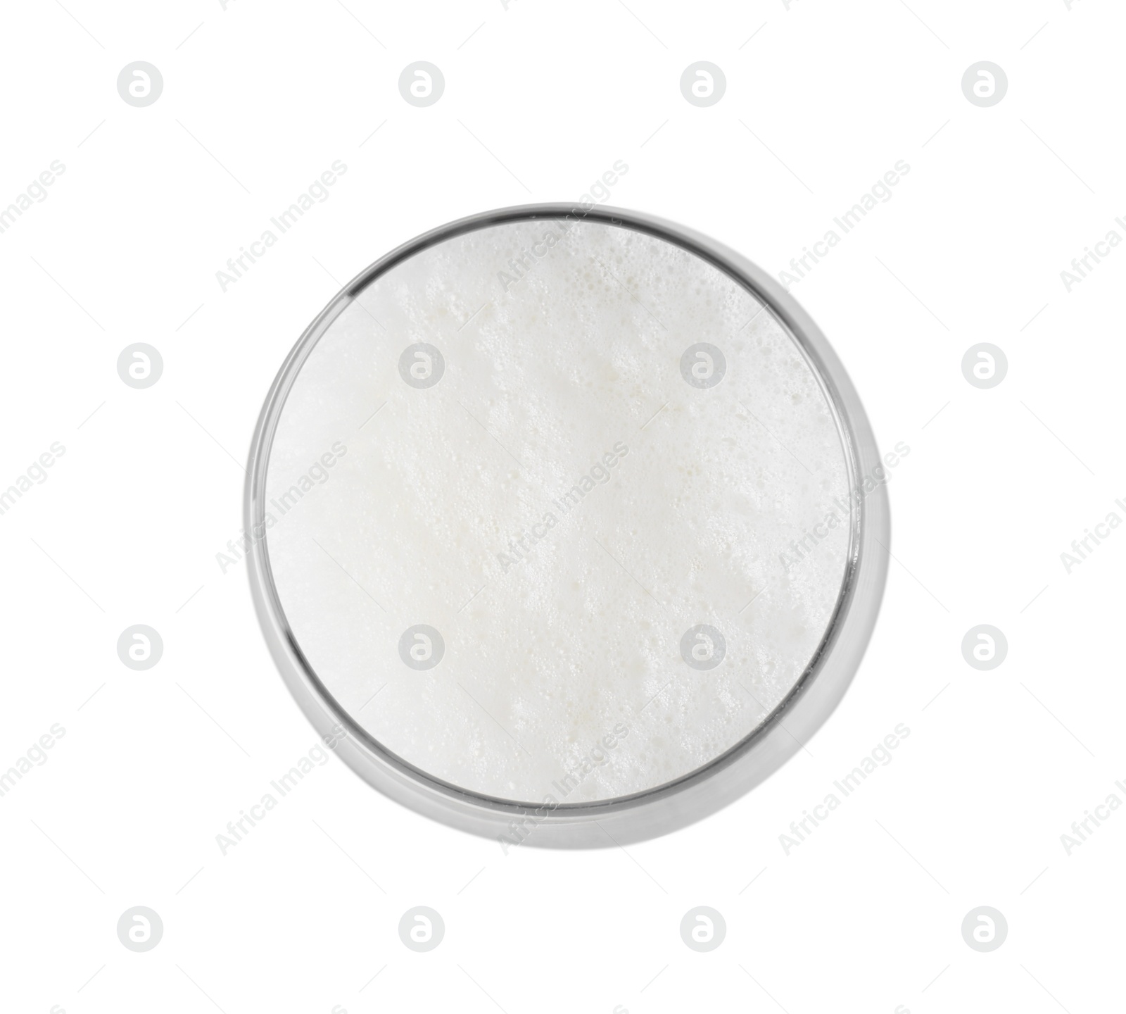 Photo of Glass of fresh milk isolated on white, top view