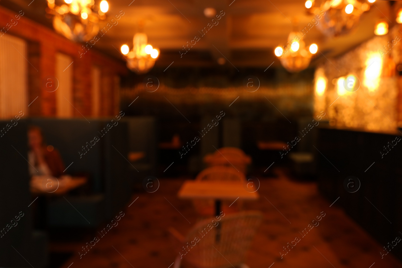 Photo of Blurred view of cafe interior with bokeh effect