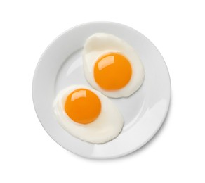 Plate with tasty fried eggs isolated on white, top view
