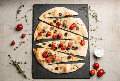 Photo of Flat lay composition with focaccia bread on light grey table