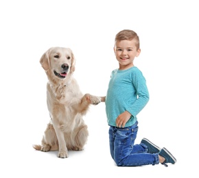 Photo of Cute little child with his pet on white background