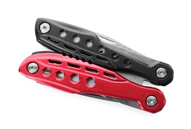 Photo of Compact portable multitool with color handles isolated on white, top view