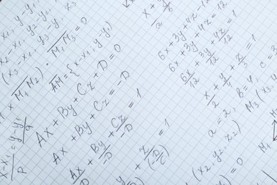Sheet of paper with different mathematical formulas, top view
