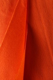 Orange textured material as background, closeup view