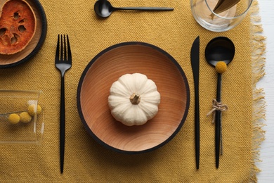 Photo of Autumn table setting with pumpkin on white background, flat lay