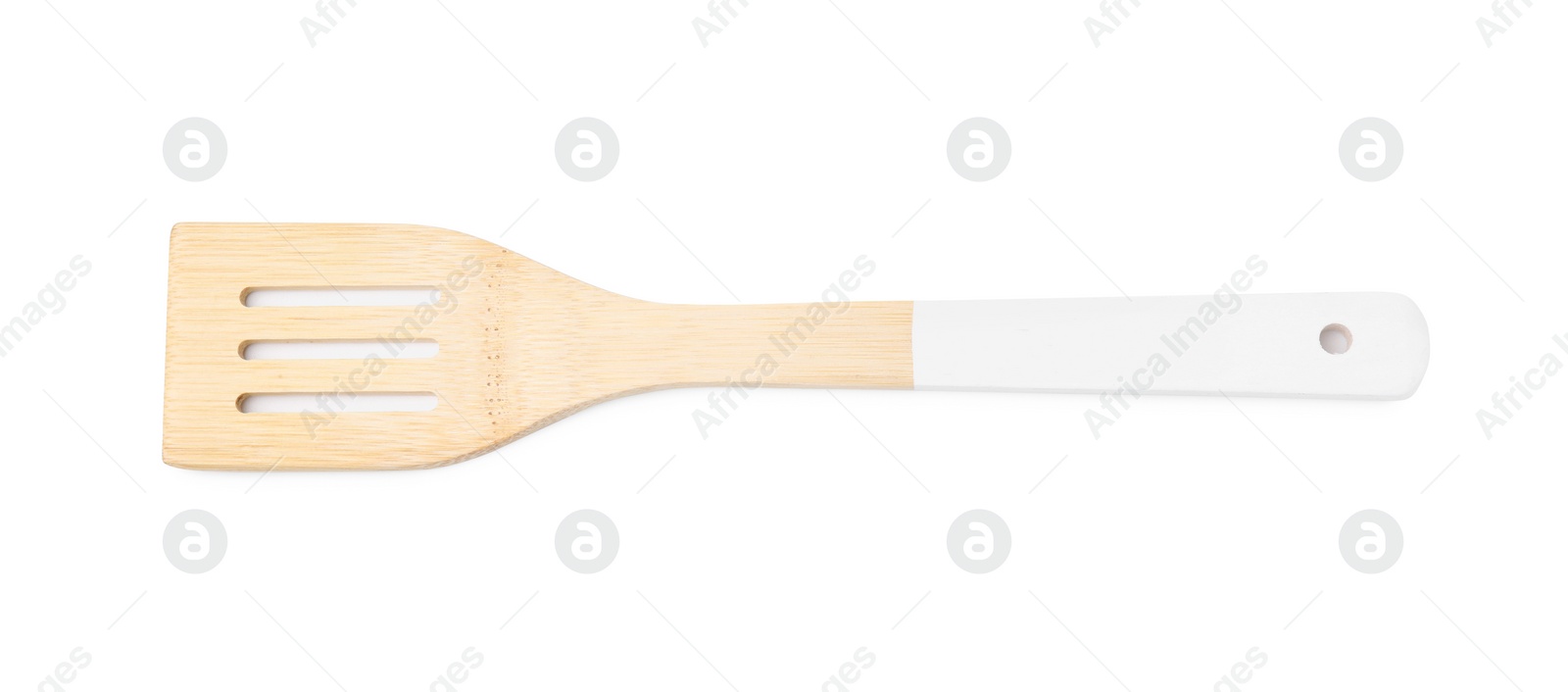 Photo of One wooden slotted turner isolated on white, top view. Cooking utensil