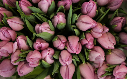 Photo of Beautiful bouquet of tulip flowers, top view