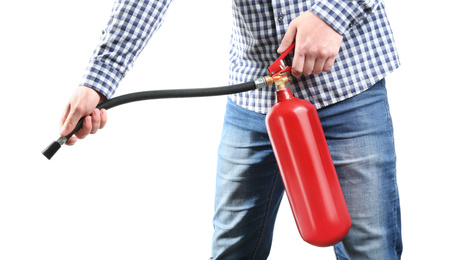 Photo of Man using fire extinguisher on white background, closeup