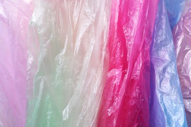 Photo of Many plastic bags as background, top view