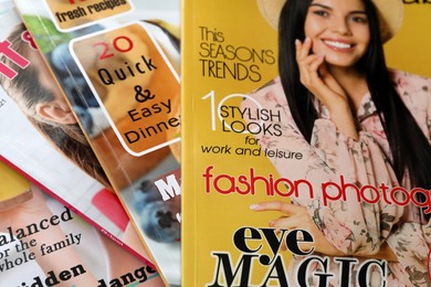 Photo of Variety of women's modern magazines, closeup view