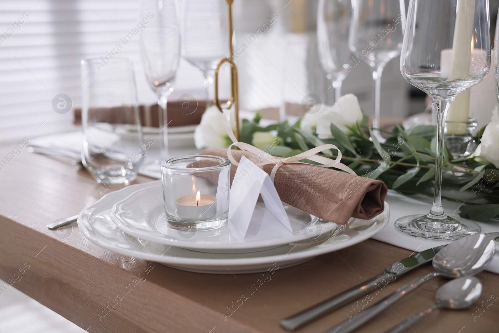 Photo of Festive table setting with beautiful tableware and decor indoors