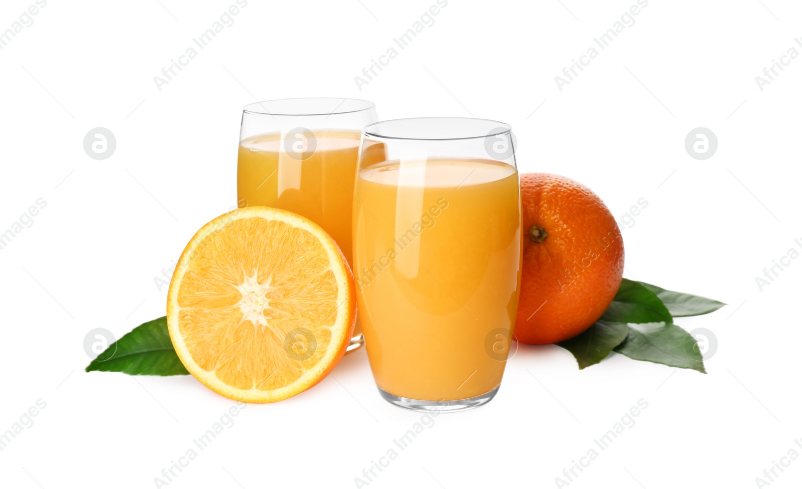 Photo of Orange juice, fresh fruits and green leaves on white background