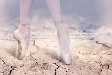 Image of Perfection in ballet. Woman dancing in pointe shoes on cracked ground, closeup