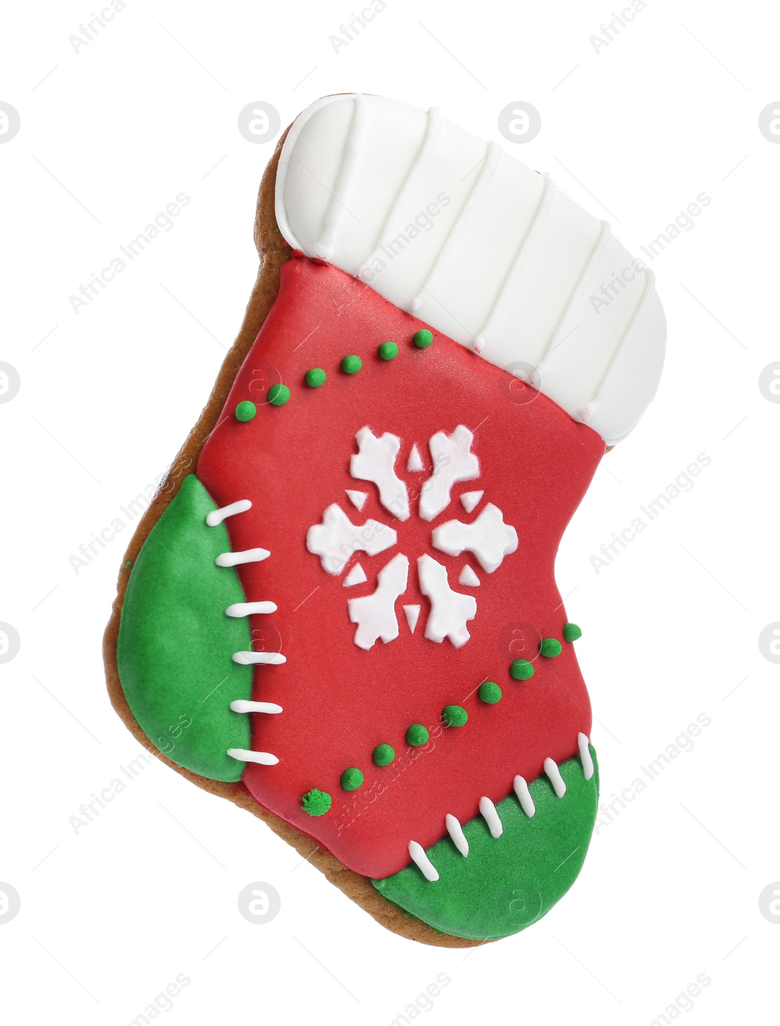 Photo of Christmas cookie in shape of stocking isolated on white