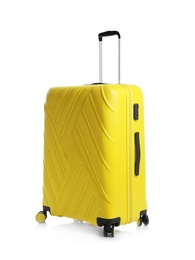 Photo of Yellow suitcase for travelling on white background