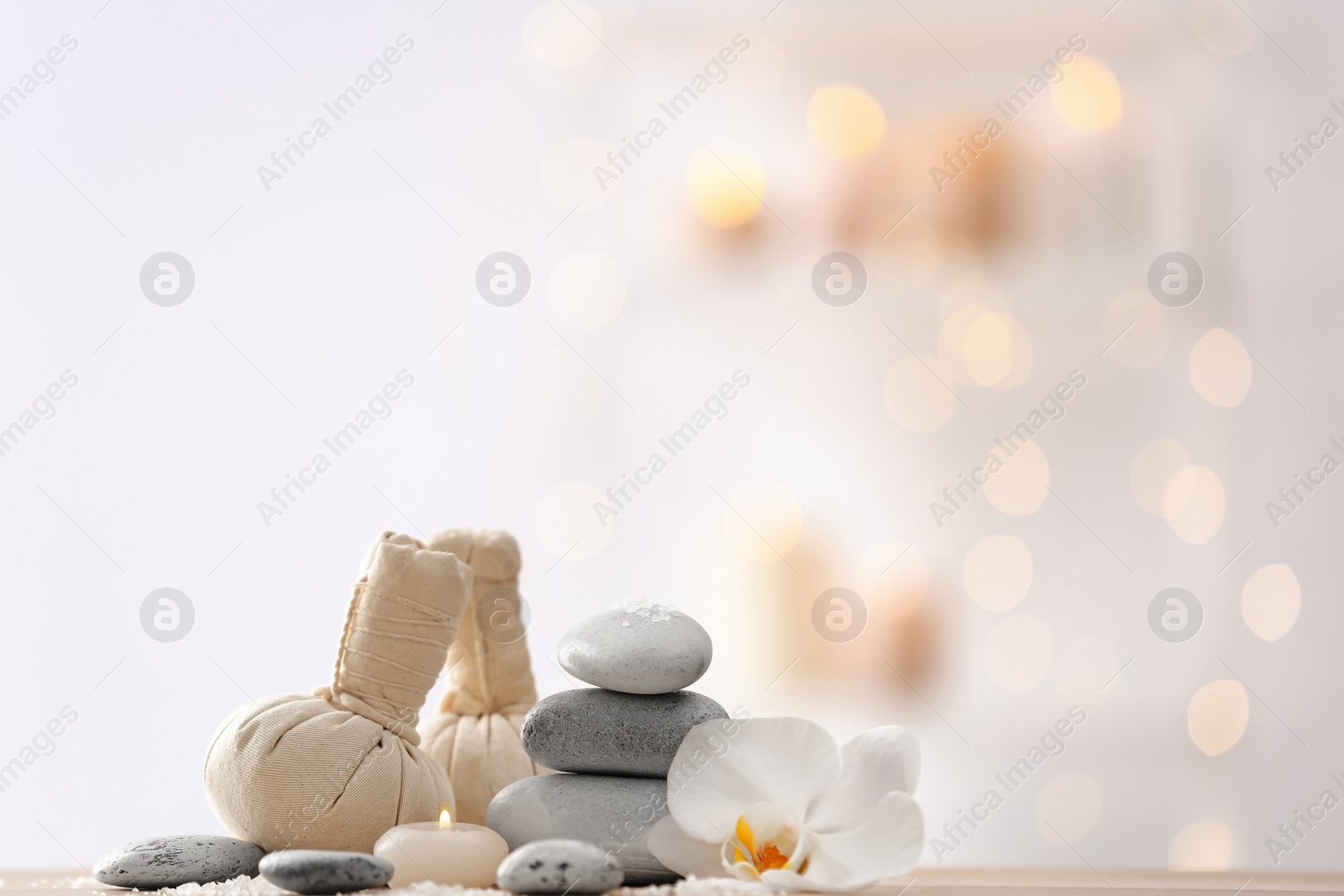 Photo of Beautiful spa composition on table in wellness center