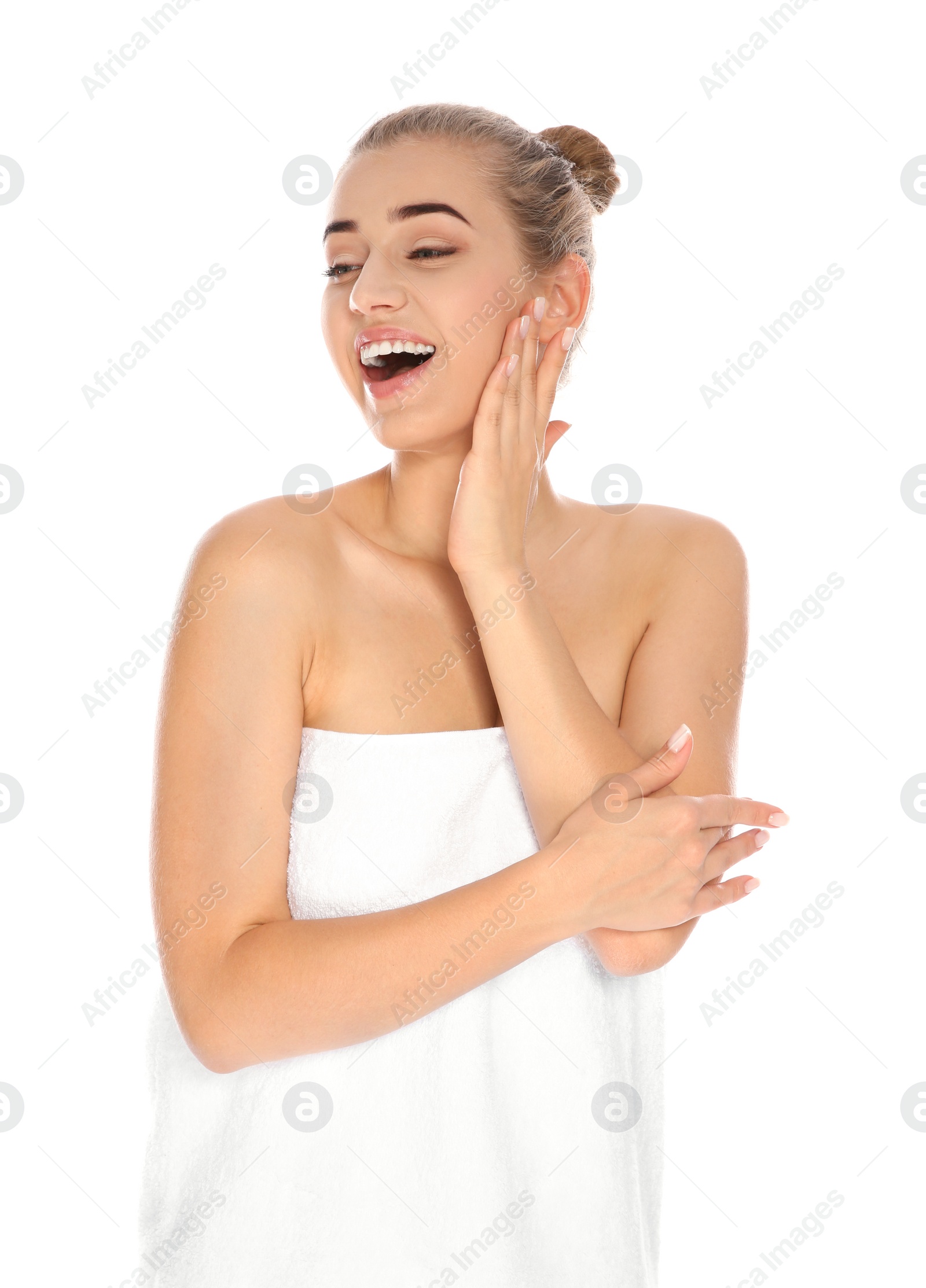 Photo of Portrait of young pretty woman with towel on white background