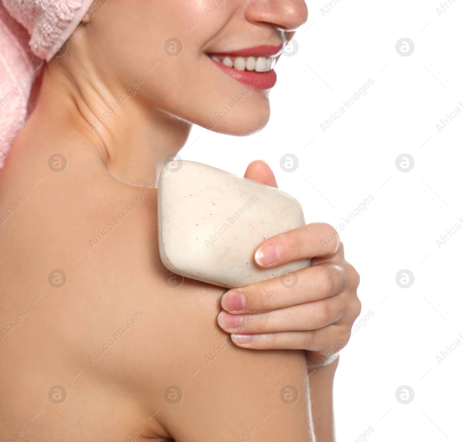 Image of Beautiful young woman with soap bar on white background, closeup