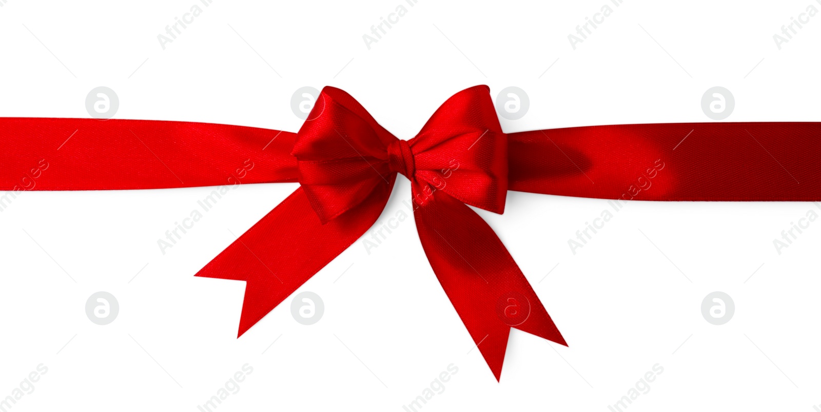 Photo of Red satin ribbon with bow isolated on white, top view