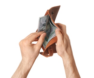 Man holding wallet with dollar bills on white background, closeup