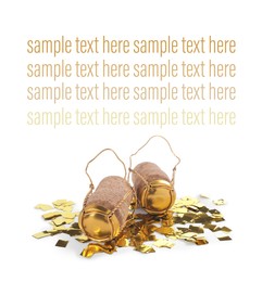 Sparkling wine corks with muselet caps and shiny golden confetti on white background. Space for design