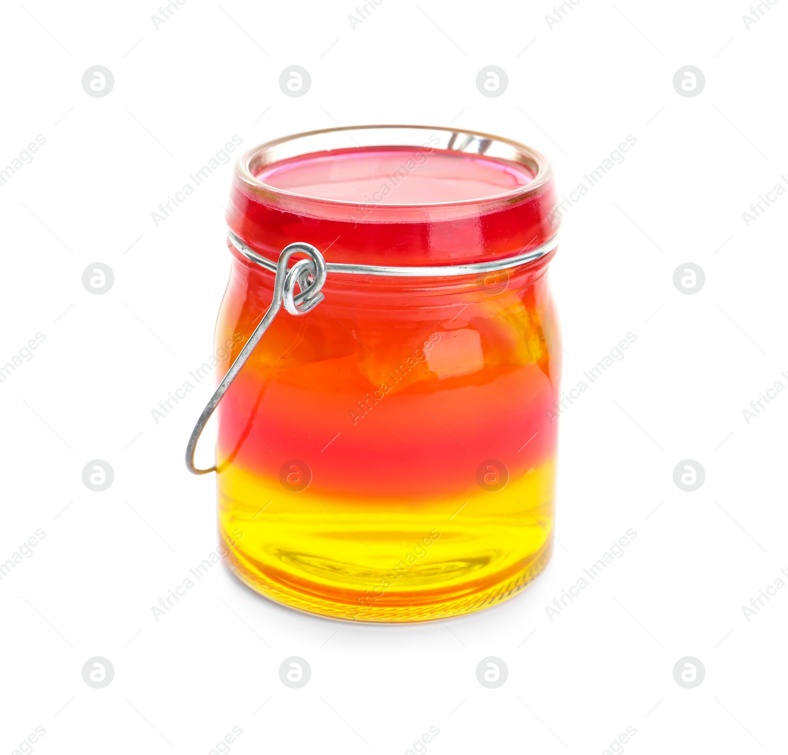 Photo of Tasty layered jelly dessert in glass jar on white background