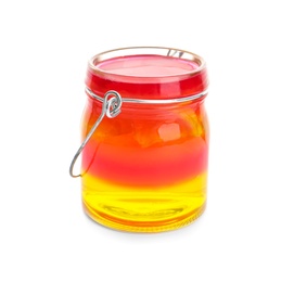 Tasty layered jelly dessert in glass jar on white background