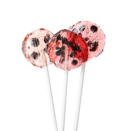 Photo of Sweet colorful lollipops with berries on white background