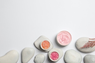 Flat lay composition with spa stones and space for text on white background