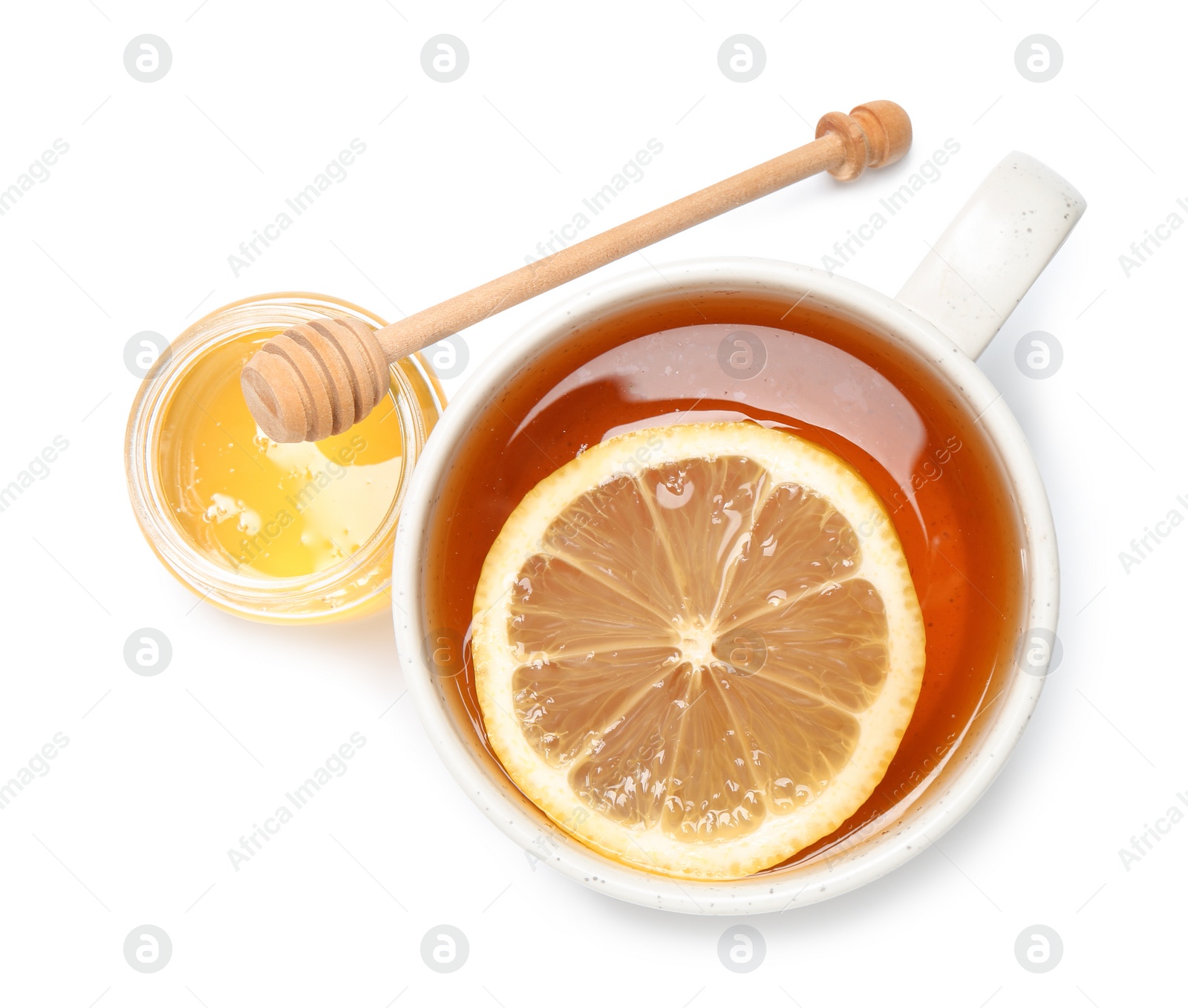 Photo of Cup of tea with lemon and honey jar on white background, top view