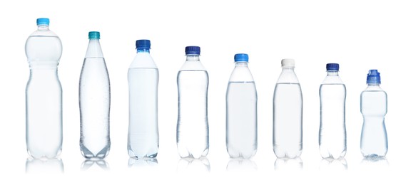 Set with different bottles of pure water on white background. Banner design