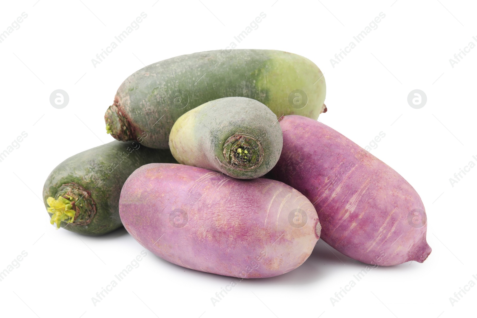 Photo of Purple and green daikon radishes isolated on white