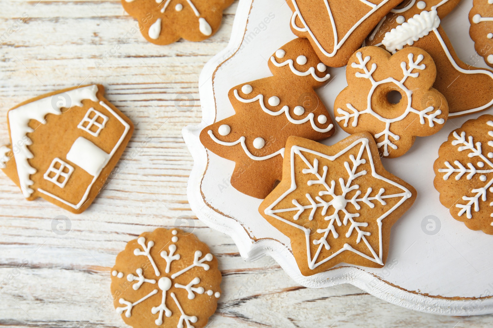 Photo of Tasty homemade Christmas cookies on table, top view