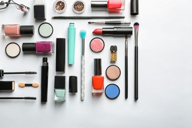 Photo of Flat lay composition with decorative cosmetics on white background