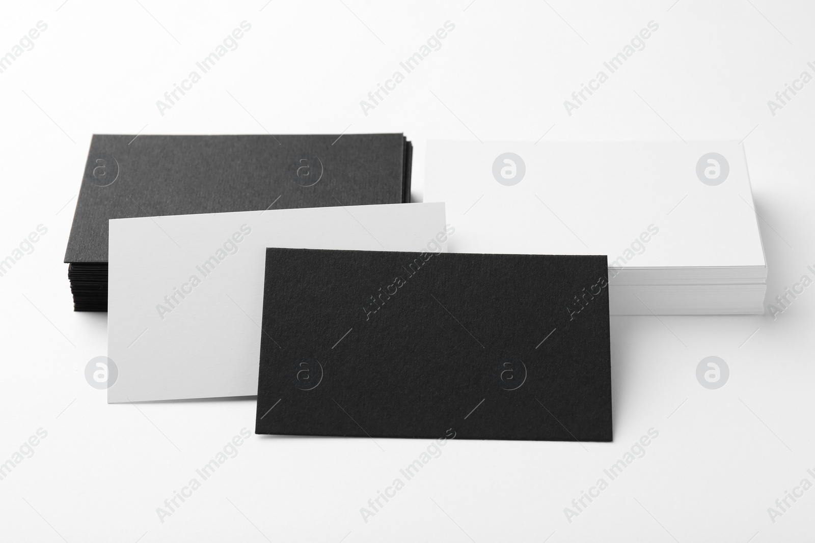 Photo of Business cards on white background. Mockup for design