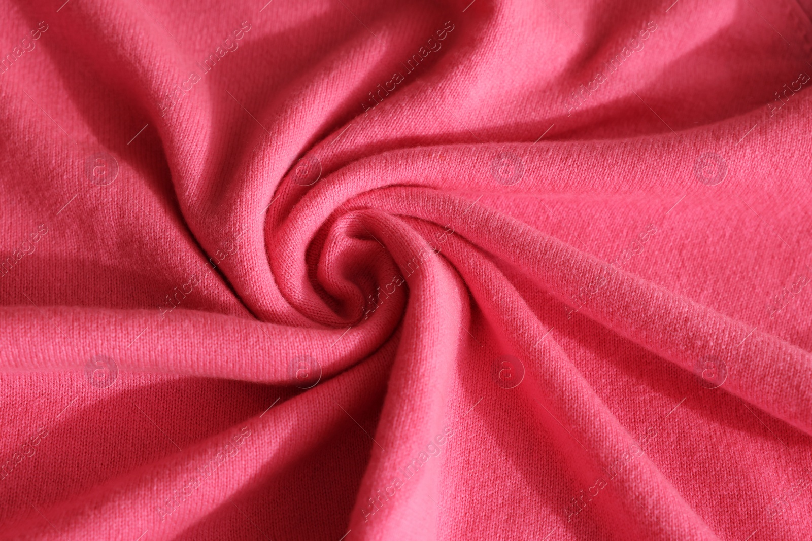 Photo of Beautiful pink fabric as background, top view