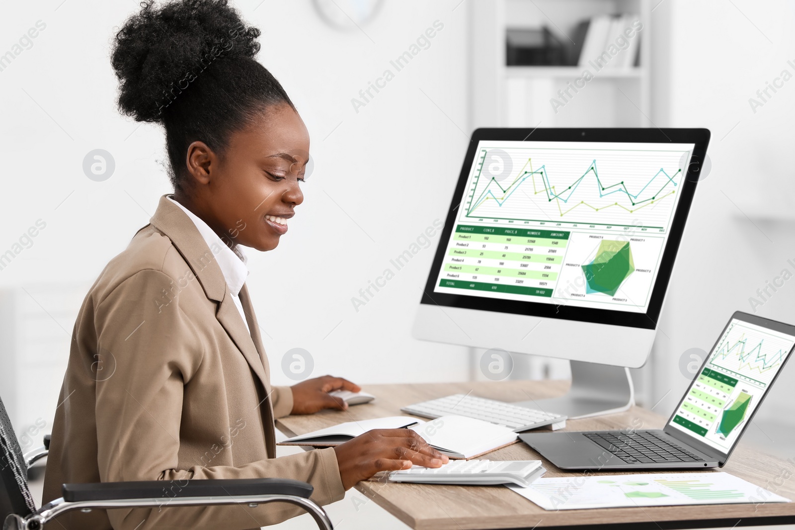 Photo of Professional accountant working at wooden desk in office