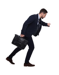 Handsome bearded businessman in suit with briefcase on white background