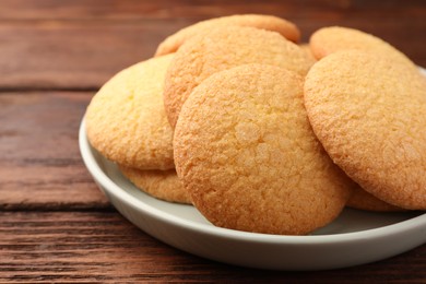 Delicious Danish butter cookies on wooden table, closeup