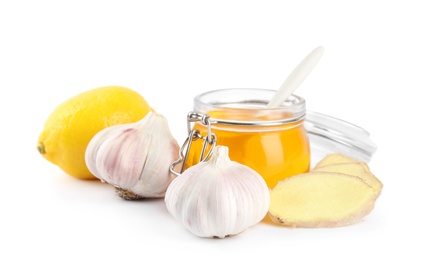 Photo of Composition with garlic and other cold remedies on white background