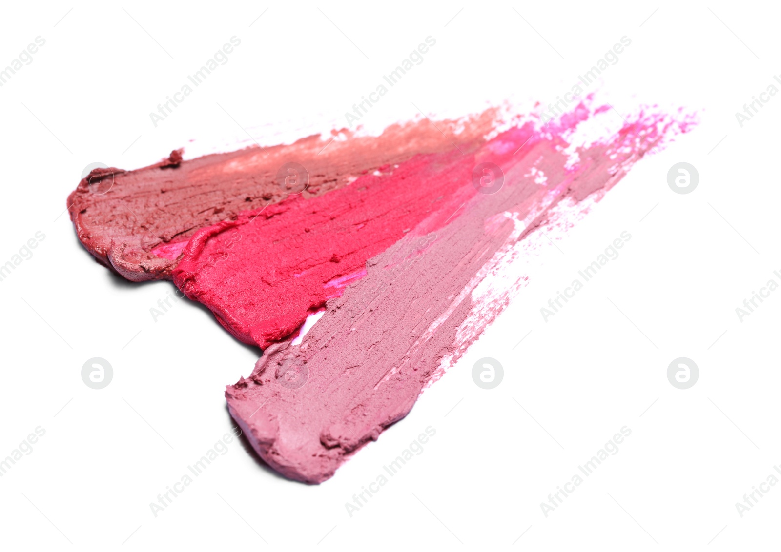 Photo of Smears of different beautiful lipsticks on white background