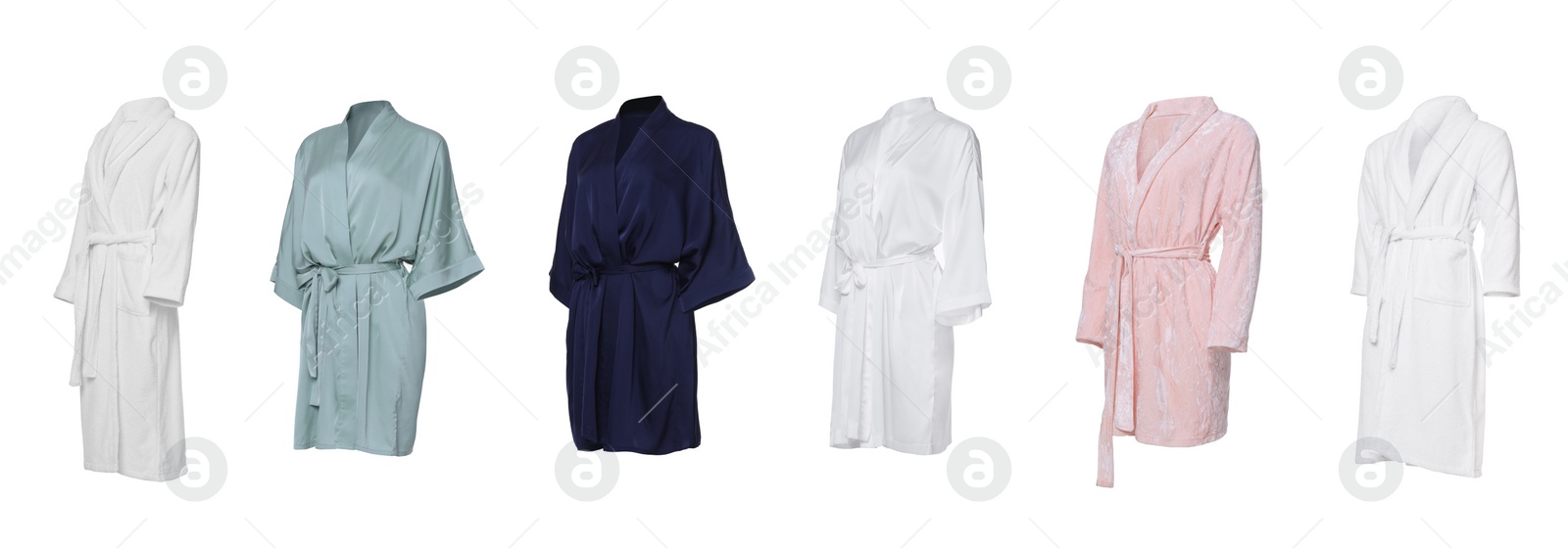 Image of Set of different bathrobes on white background
