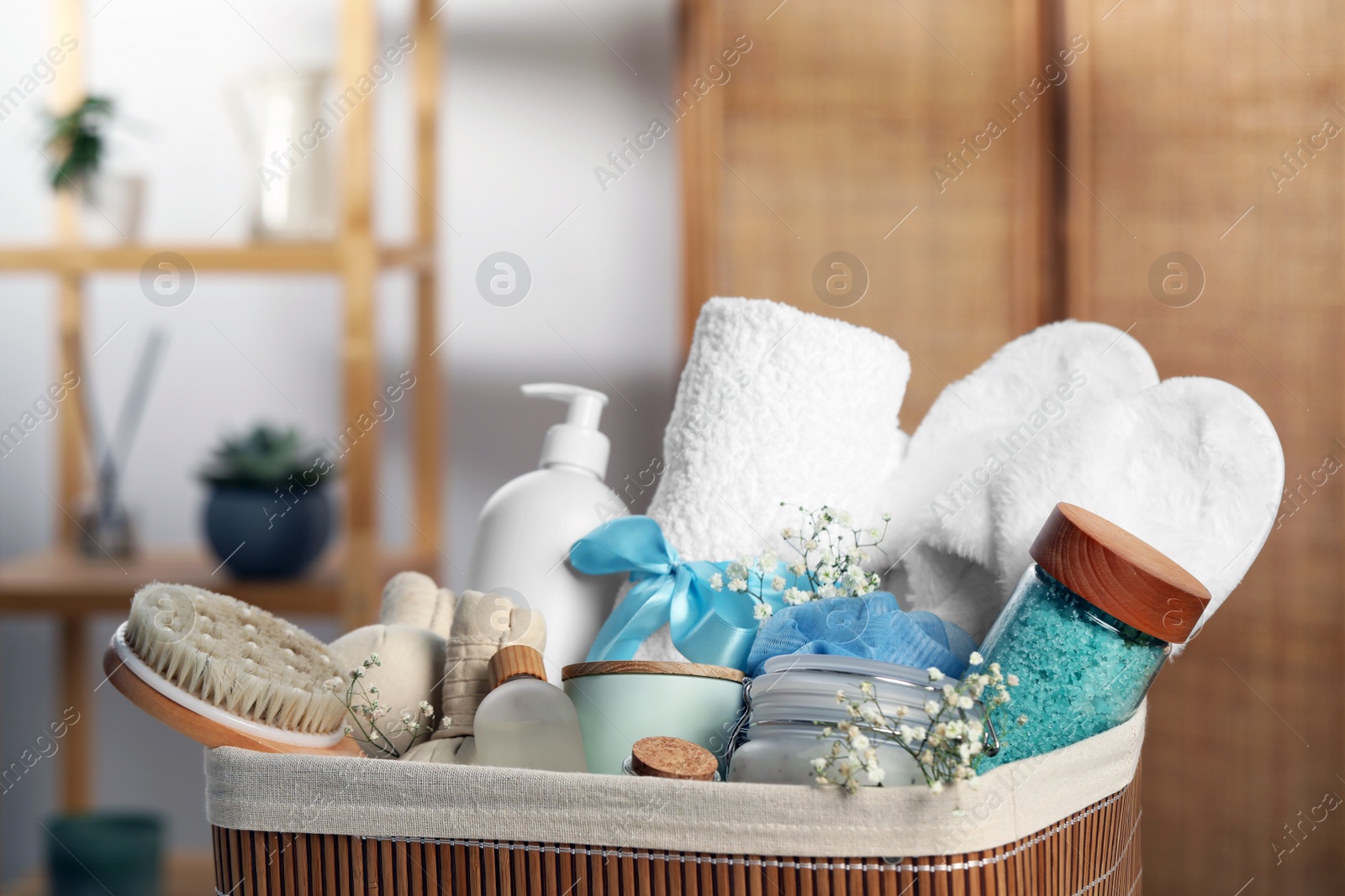 Photo of Spa gift set with different products in bathroom, closeup